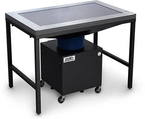 industrial woodworking downdraft table with perforated steel top surface and built in vacuum extraction unit